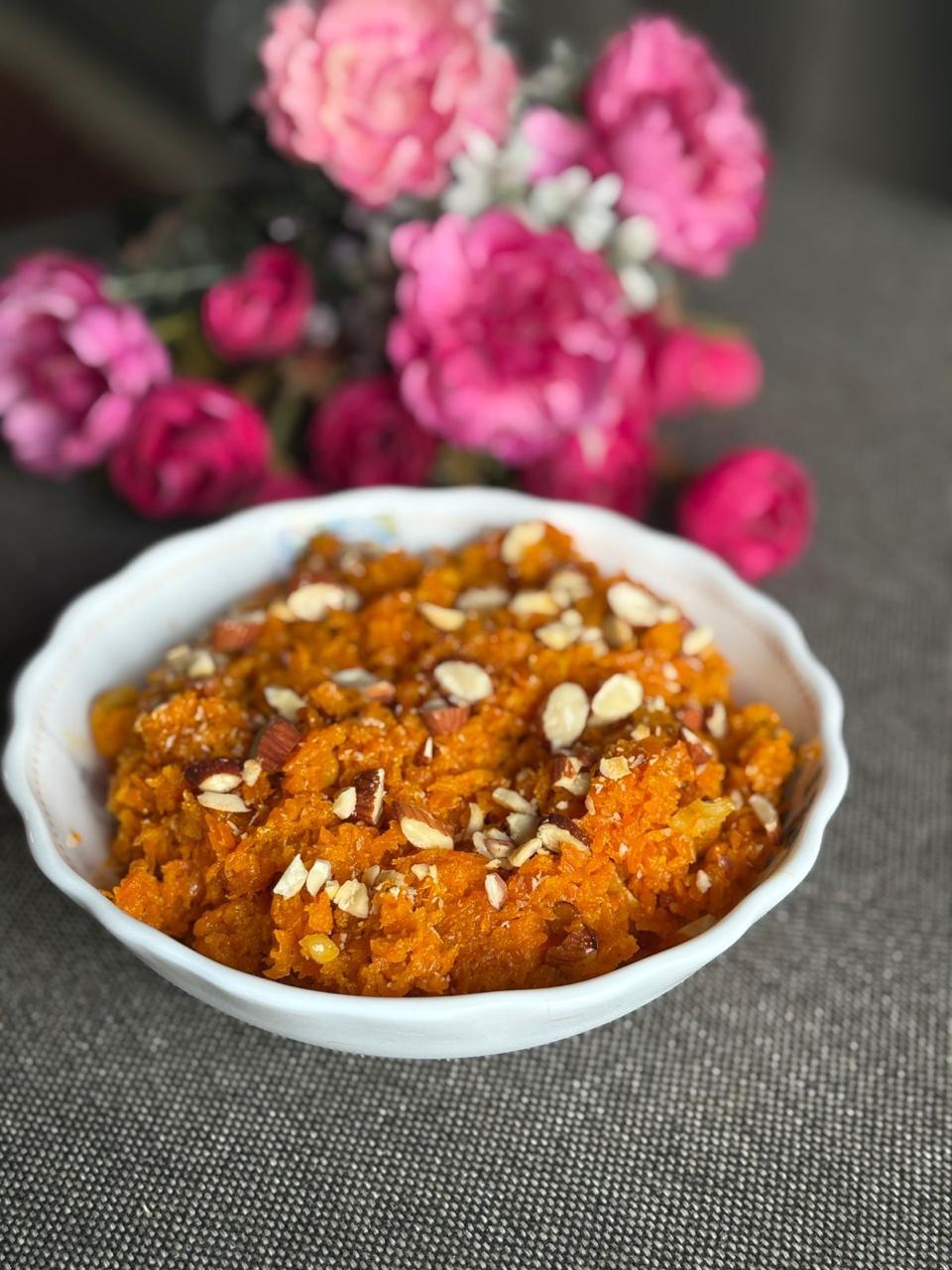 Gajar halwa topped with nuts